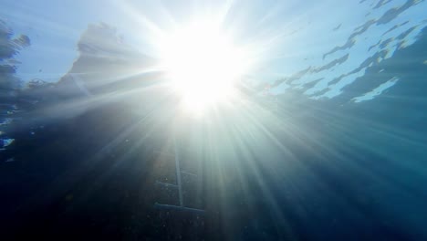 Sunray-Through-Blue-Waters-Of-The-Sea-In-Dahab,-Egypt