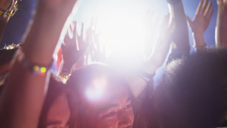 group of people dancing at a concert 4k