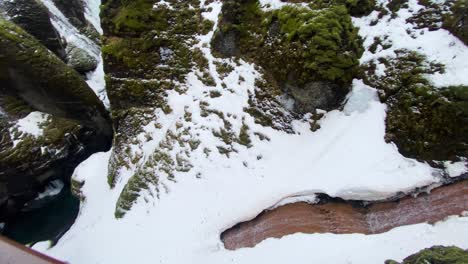 mogafoss waterfall viewpoint in winter, pov from platform in skaftarhreppur, southern iceland