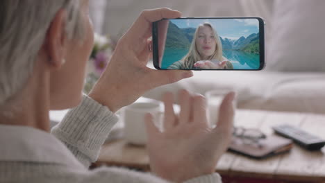 mature-woman-having-video-chat-using-smartphone-waving-at-daughter-on-vacation-in-norway-sharing-travel-experience-on-mobile-phone-enjoying-connection-chatting-to-grandmother-4k