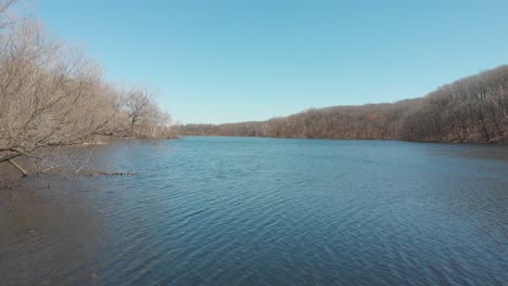 Lake-in-Minnesota,-dry-season,-dry-trees