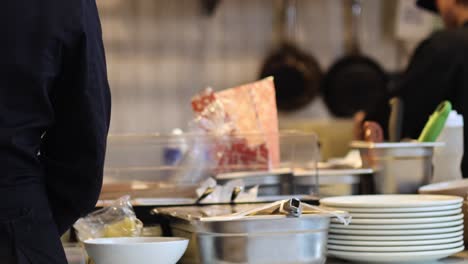 chefs working together in a busy kitchen