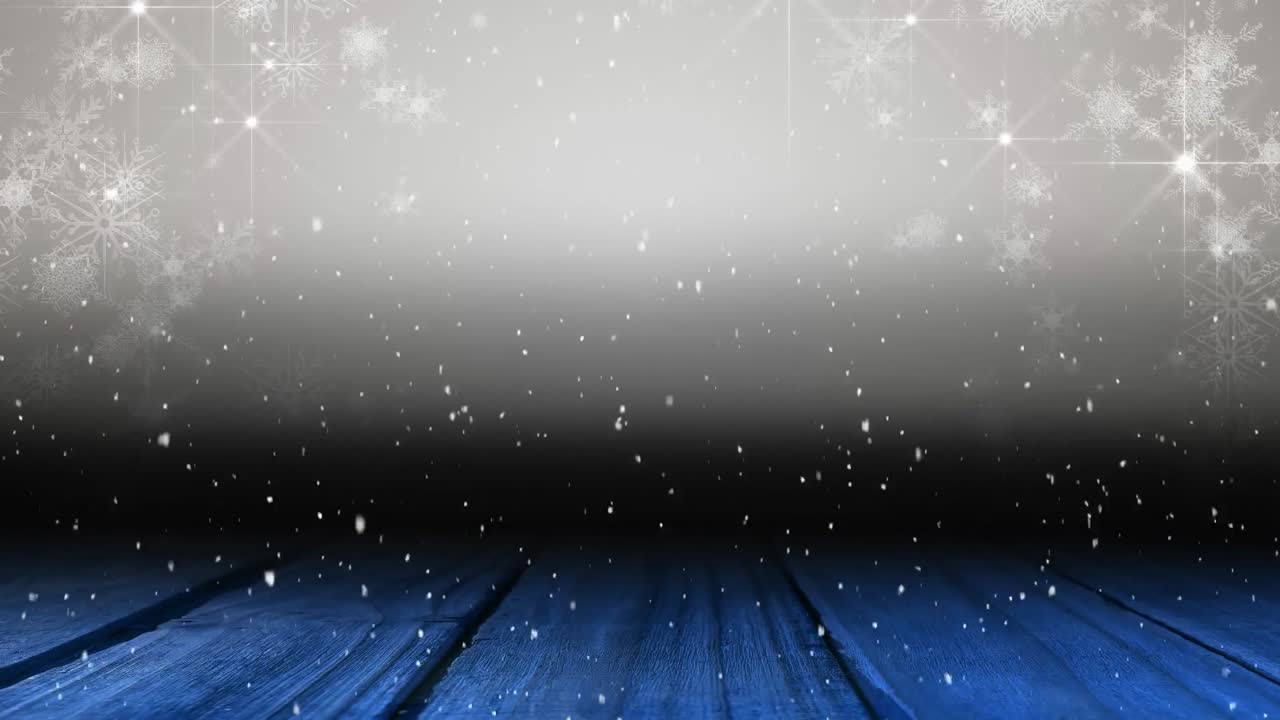 복사 공간과 나무 보드와 함께 빛의 반점 위에 떨어지는 눈의 애니메이션