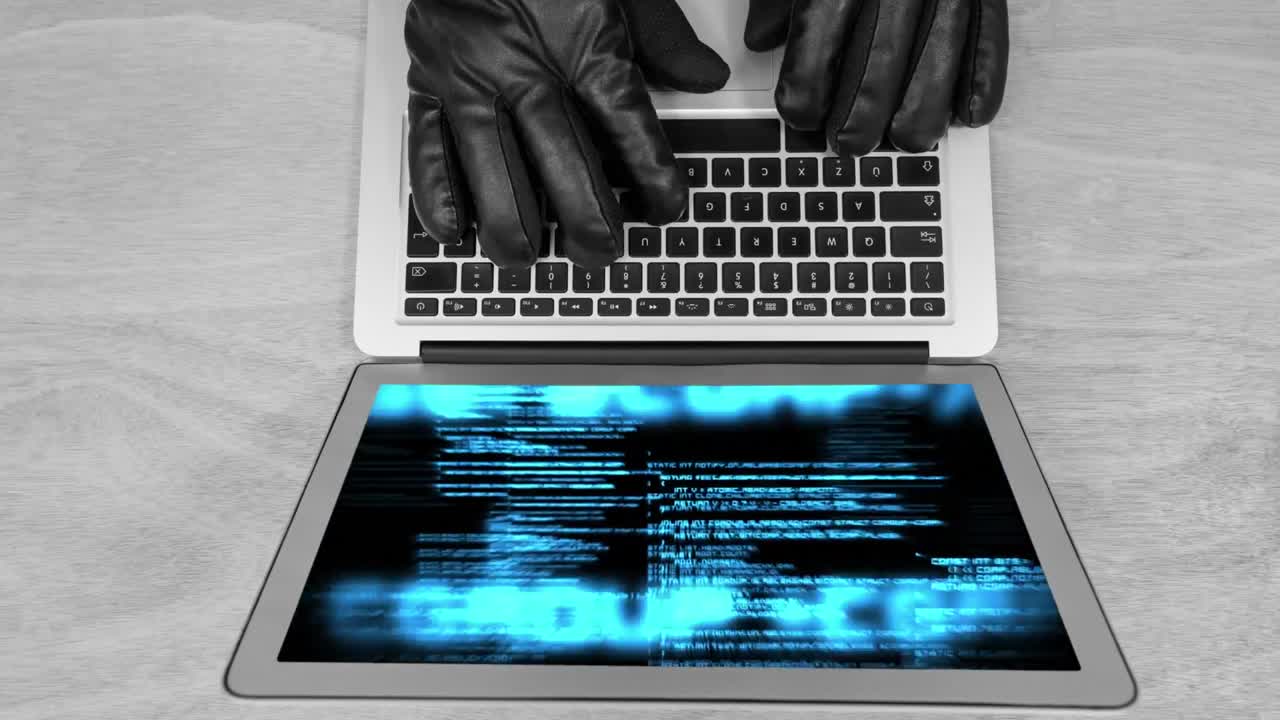 Didital animation of hackers hands on the laptop keyboard 4K