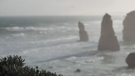 waves crashing against iconic limestone stacks