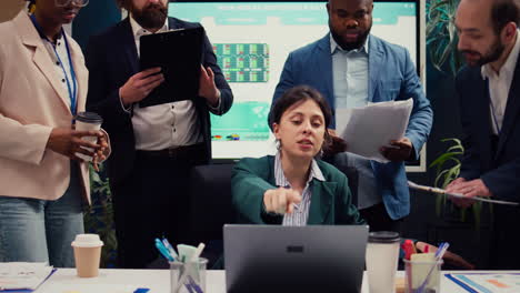 irritated difficult boss getting angry at her employees team