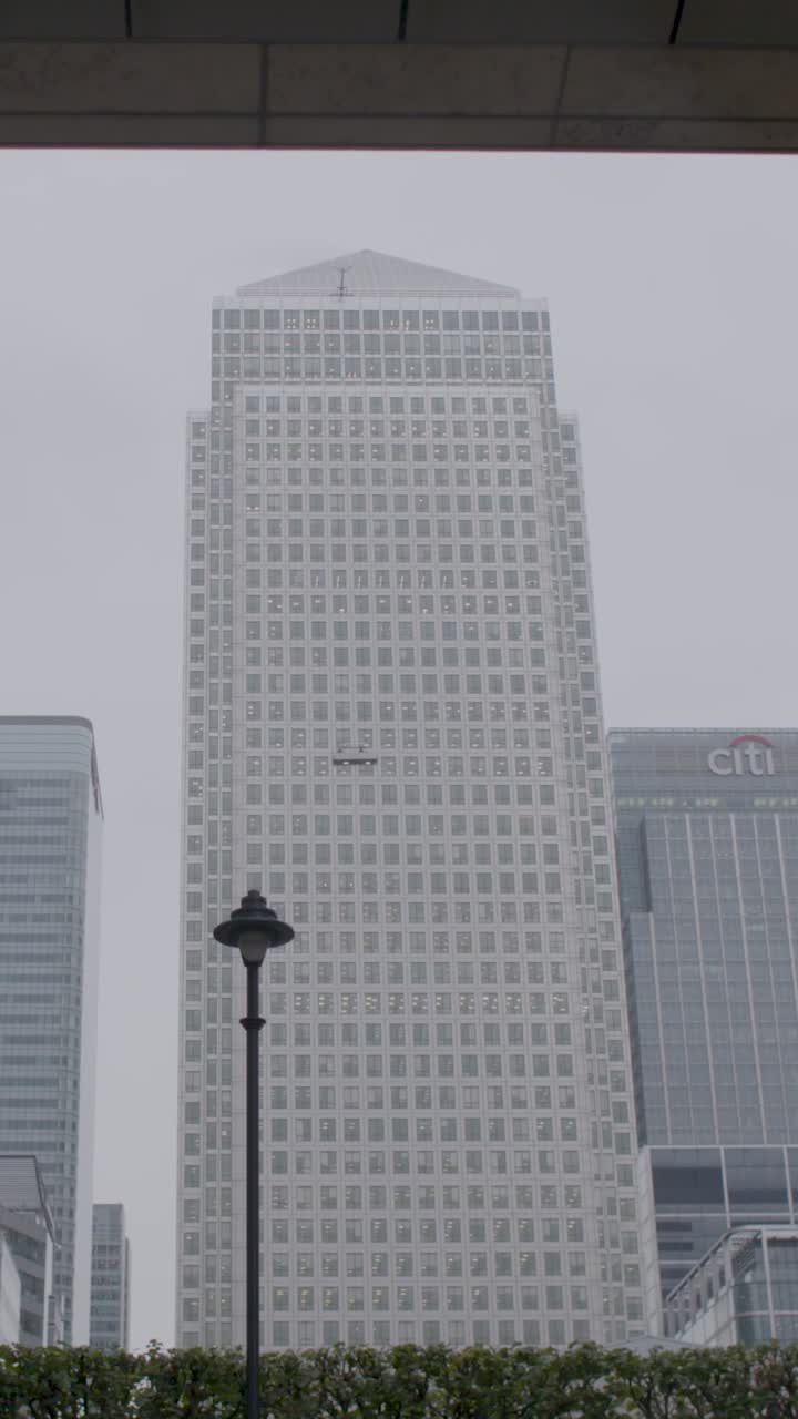 London skyscraper view in overcast weather, vertical orientation