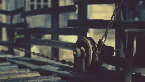 close-up of an old mechanical pulley system