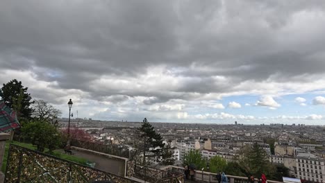 overlooking paris from sacre coeur, cloudy sky