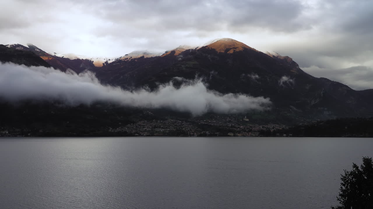 Clouds and surrounding mountains of Lake Como, Italy