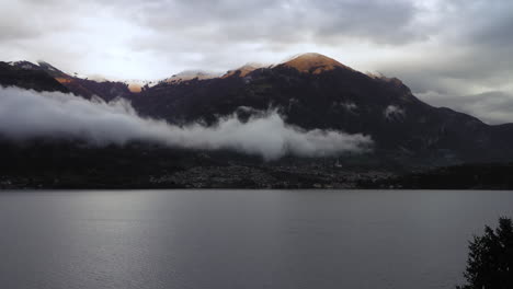 clouds and surrounding mountains of lake como, italy