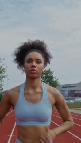 woman running on a track