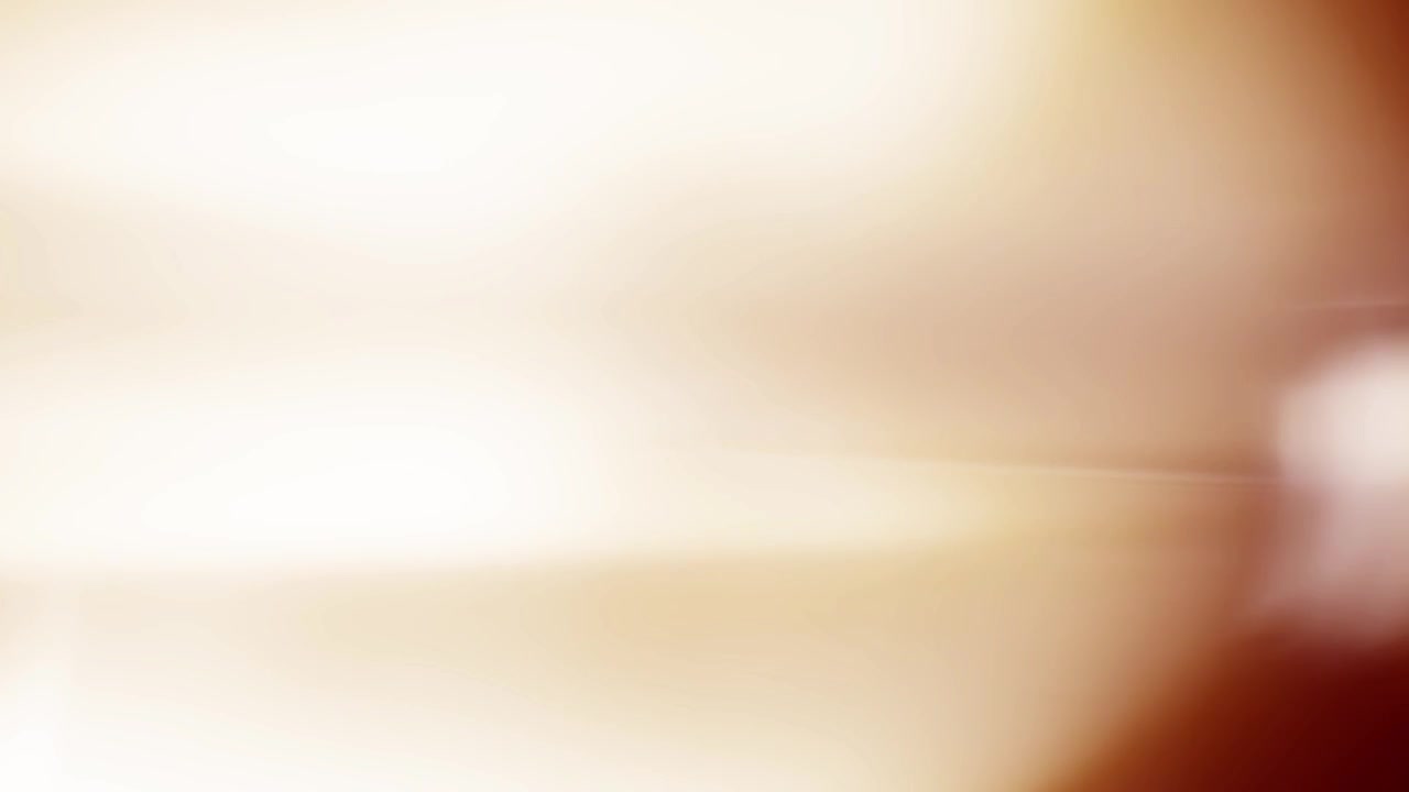 Warm Light Leak and Lens Flare Transition Overlay
