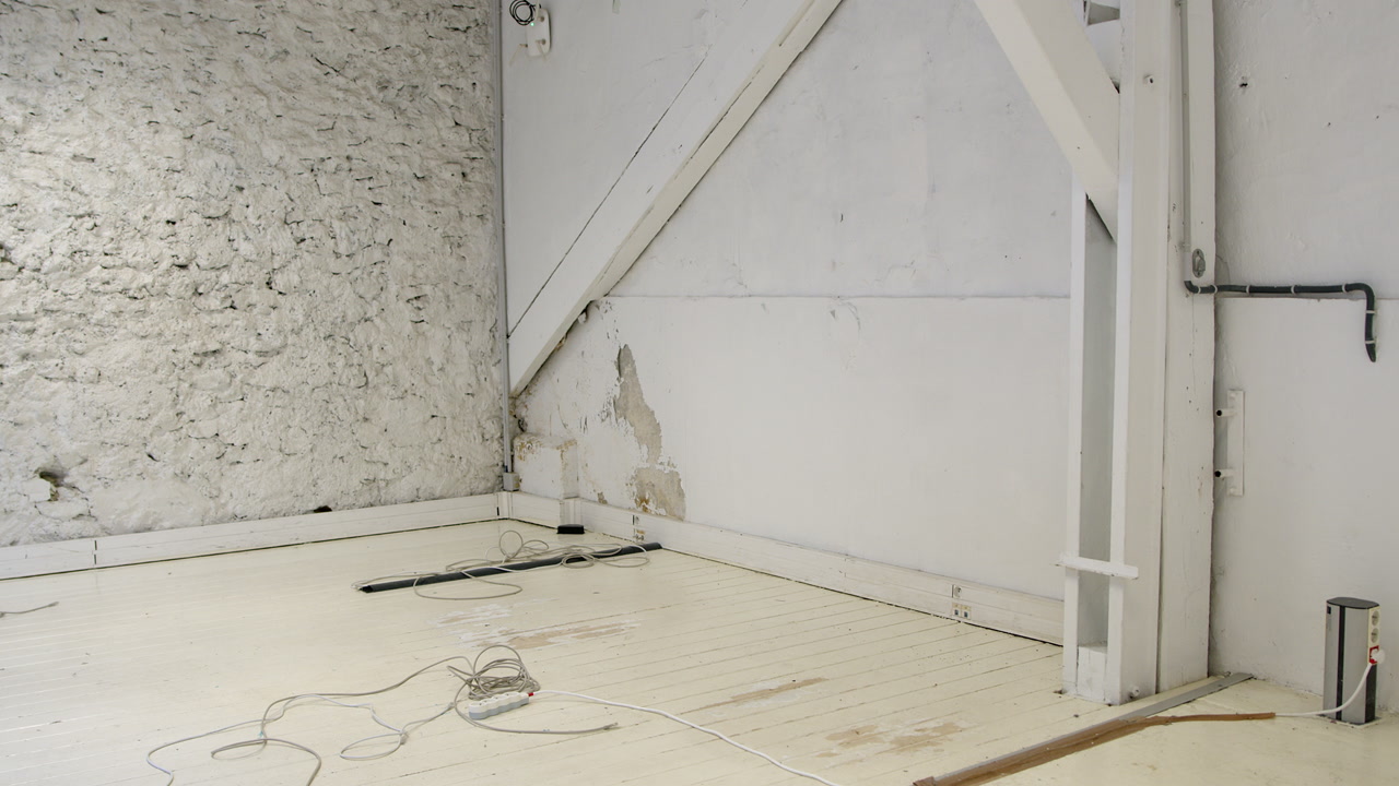 Corner Of A Basement Or Storage Area Undergoing Repair - Panning Shot