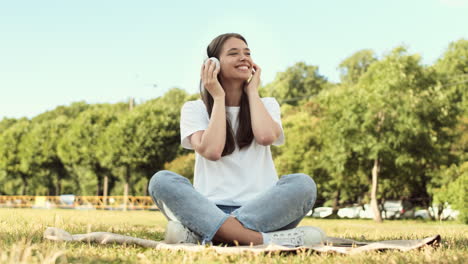 listening to music in headphones in park
