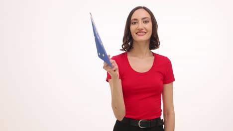 smiling woman holding european union flag
