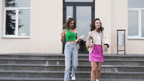 Two-friends-talking-outside-the-high-school