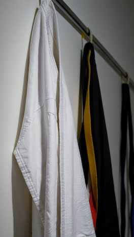 martial arts uniform and belts