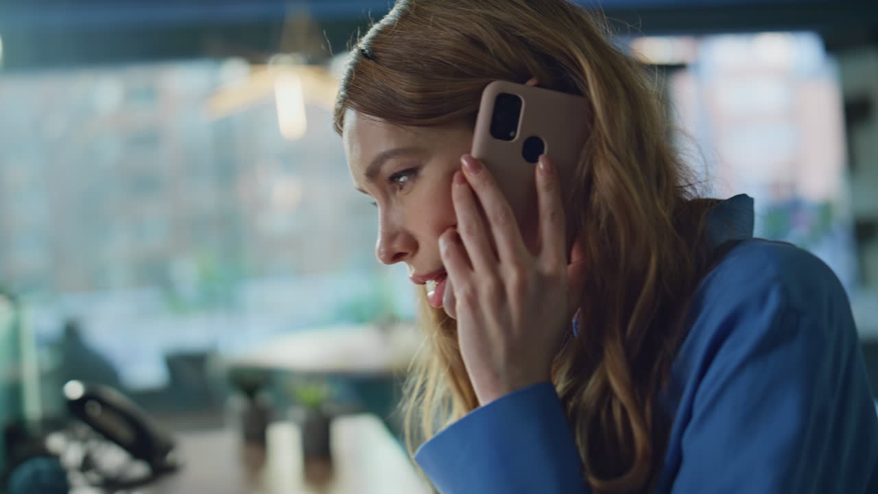 Working businesswoman answering call cellphone at office closeup. Woman hands