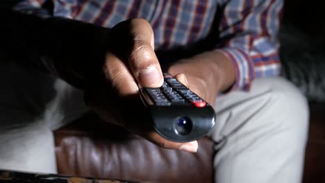 person using a remote control