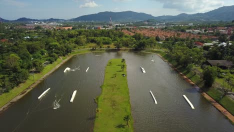 sunny day phuket island famous kathu wake park aerial panorama 4k thailand