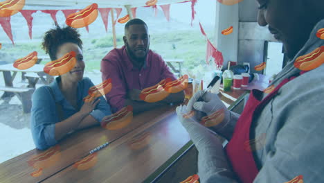 ordering food at outdoor stand, animation of hot dogs over scene