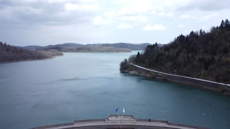 Aerial-shot-of-a-lake-and-a-hydroelectric-dam-|-4K