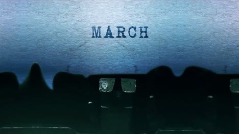 vintage typewriter showing the month of march