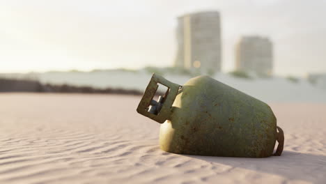 old rusted metal gas tank on the beach