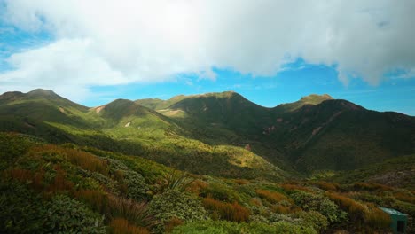 First-light-gracing-mountain-range,-a-spectacular-sunrise-over-majestic-peaks-in-the-untouched-wilderness