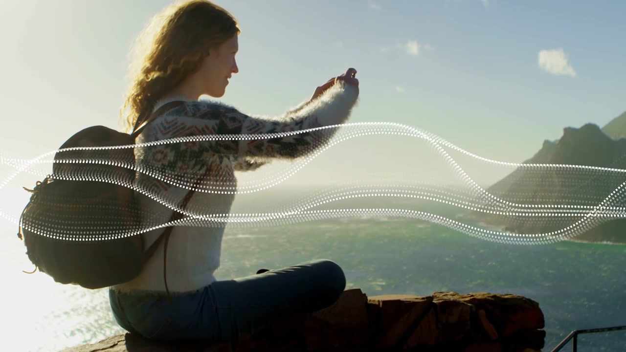 Woman tapping device framing sea capturing view while technology dotted-wave overlay sweeping frame