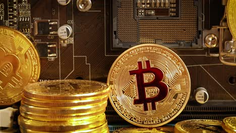 gold bit coin btc coins on the motherboard. bitcoin is a worldwide cryptocurrency and digital payment system called the first decentralized digital currency.