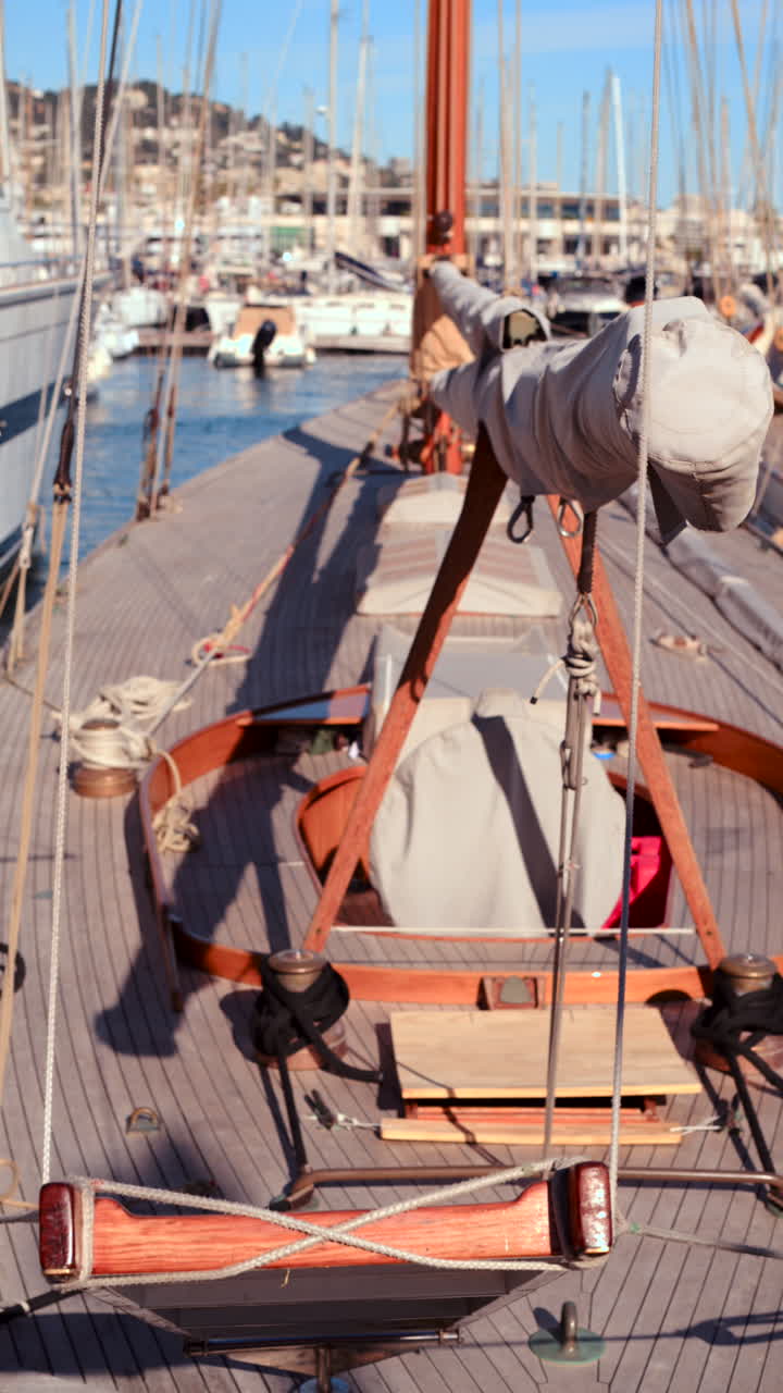 Close up of the top of a boat docked in a harbour. Vertical