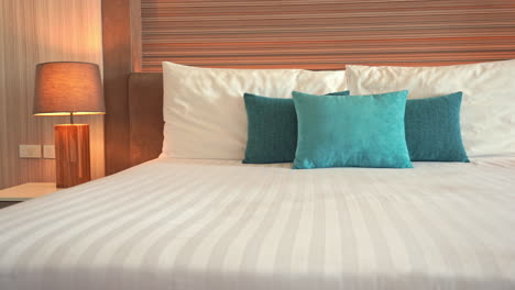 Pan-across-a-resort-hotel-bed