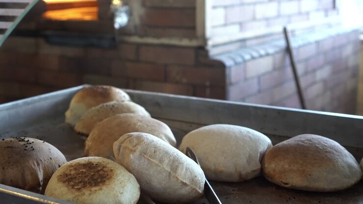 Egyptian aish baladi flatbread fresh bake from oven