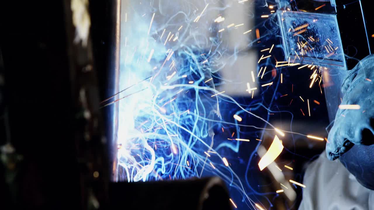 Welder welding a metal