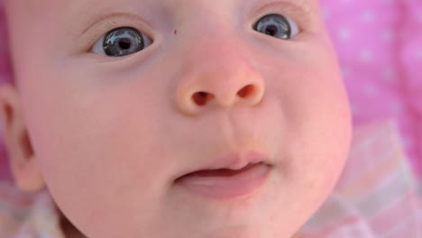 blue-eyed three months baby girl