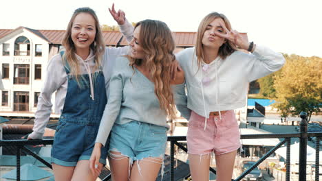 three happy friends enjoying a day in the city