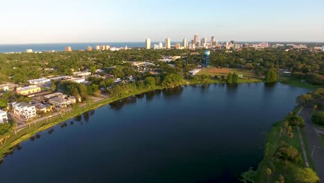 4k aerial tilt video from crescent lake to downtown st petersburg skyline