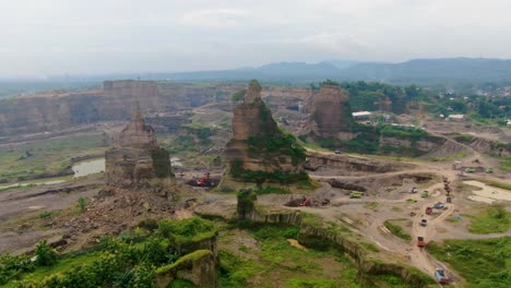 Aerial-truck-drive-though-opencast-sand-mine-Brown-Canyon-in-Semarang-Indonesia