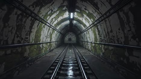 dark empty train tunnel perspective