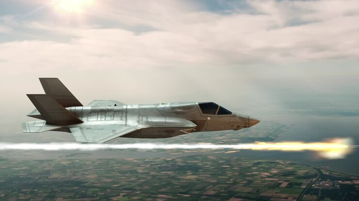 Military Jet Flying Over Countryside