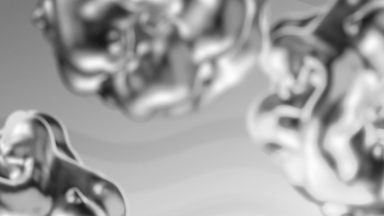 animación de formas y burbujas sobre un fondo gris en movimiento.