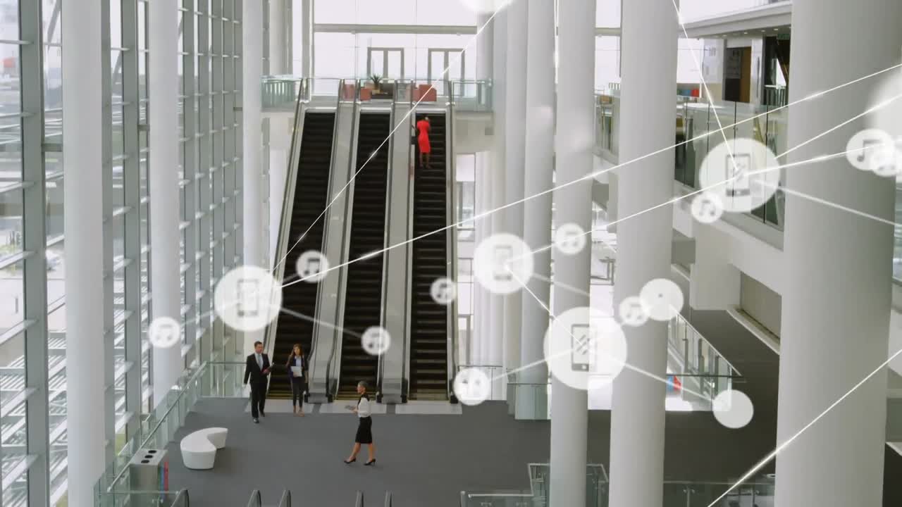 red de iconos digitales contra la vista desde arriba de la oficina moderna