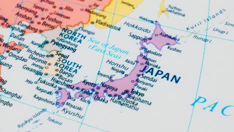 Close-up-of-the-country-word-Japan-on-a-world-map-with-the-detailed-name-of-the-capital-city