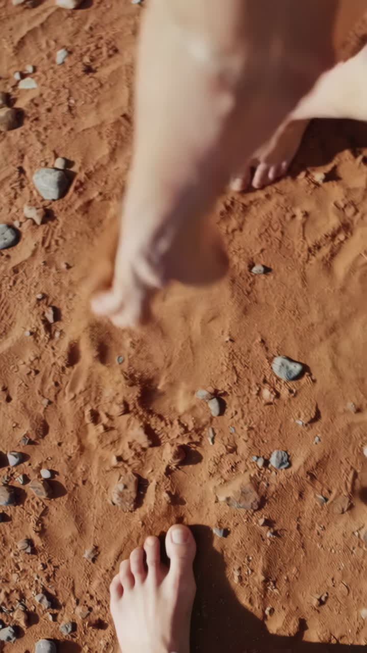 Bare Feet on Red Desert Sand