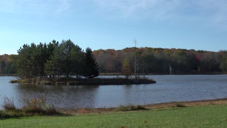 an island in the middle of a lake in the wilderness