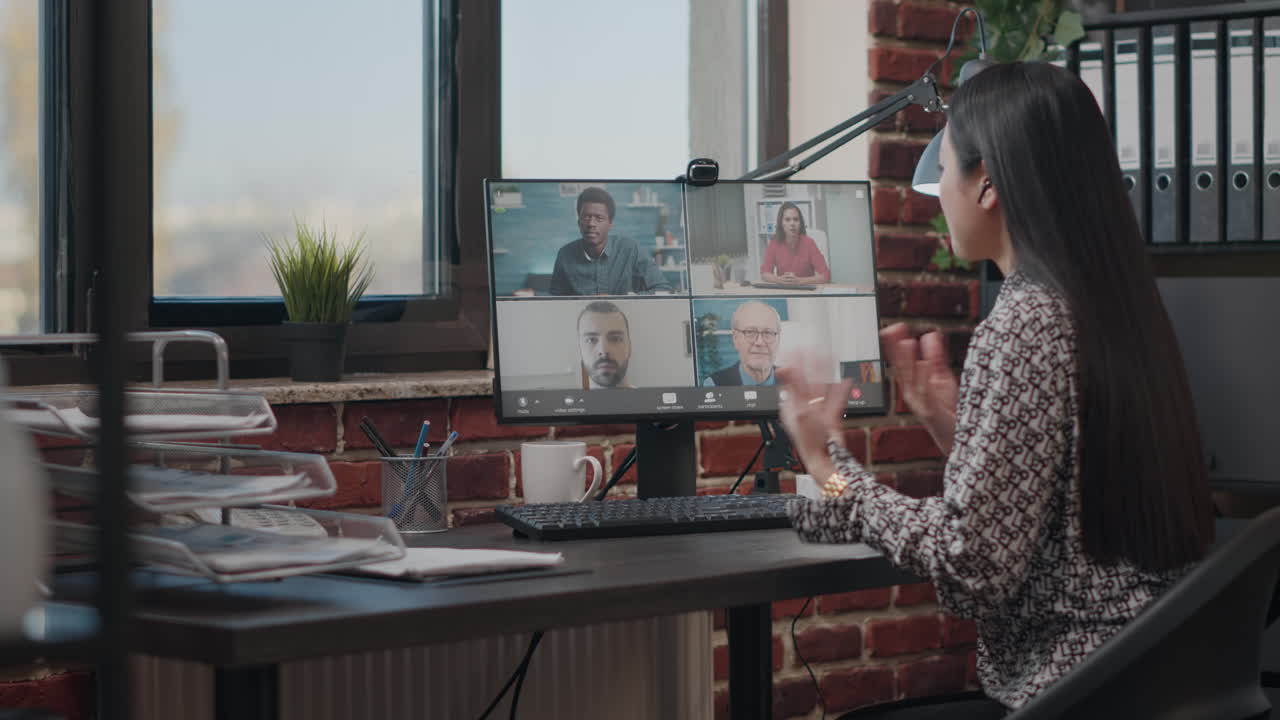 Employee talking to workmates on online video call