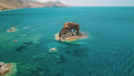 aerial shot of the south coast of crete with turquoise waters and beautiful scenery