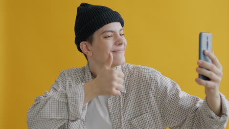 Young Man Taking a Selfie or Video Call